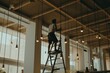 © Yuliia - Man repair light lamp chandelier lighting cafe restaurant establishment inside design interior worker eatery modern style comfortable decor equipment illuminated service cosy hotel luxury architecture