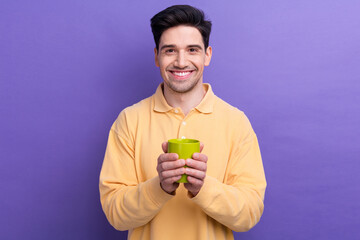 Canvas Print - Photo of charming funky guy wear yellow polo enjoying morning coffee isolated violet color background