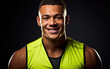 © hakule - smiling Professional Athlete in dark background
