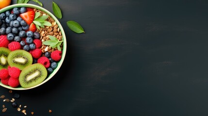 Wall Mural - Fresh and colorful bowl of fruits, berries and seeds. Healthy food concept background with free place for text