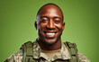 © hakule - Happy smiling soldier with camouflage in the color background