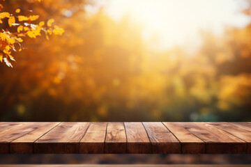 Wall Mural - Empty wooden top table with blurred autumn background.