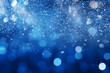Blaue funkelnde Lichter Festlicher Hintergrund mit Textur. Abstrakt Weihnachten glitzernde helle Bokeh unscharf und fallende Sterne. Winter-Karte oder Einladung