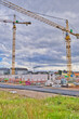 © Vincenzo - Construction site with high construction crane for building houses