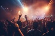 © Ева Поликарпова - A vibrant image capturing a crowd of people at a concert, all with their hands raised in excitement. Perfect for showcasing the energy and enthusiasm of live music events.