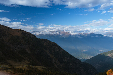 Wall Mural - The Val Madre, one of the Valtellina valleys during an autumn day near the town of Colorina, Lombardy, Italy - October 15, 2023.