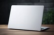 © dashtik - Laptop empty cover mock up on the table
