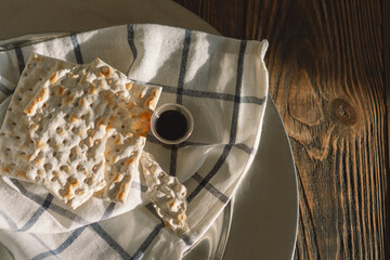 Wall Mural - Communion. Religious tradition of breaking bread. Bread and wine as a sign of memory of Christ's sacrifice.