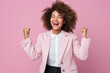 Portrait of delighted funky person raise fists attainment luck shout yes hooray isolated on pink color background