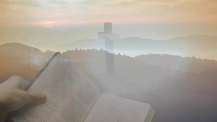 Canvas Print - Animation of cross and holly bible over landscape