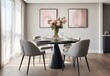 Contemporary interior design of a modern dining room with grey chairs and round table near a window against a white plain wall. Flower in the vase on the table. Elegant modern dining room.