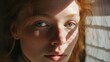 © Maria Starus - A close up of a person with red hair