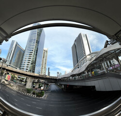 Fish eye lens.Blue sky cloud city urban building architecture sky scraper view business modern city landscape downtown travel tower landmark exterior futurist panorama wide angle street technology 