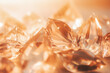 Сlose up photo of crystals floating on a light gold background