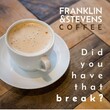© vectorfusionart - Composition of franklin and stevens coffee text over cup of coffee on wooden table