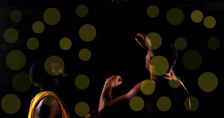 Poster - Animation of caucasian basketball player throwing ball and spots of light on black background