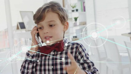 Wall Mural - animation of network of connections over caucasian boy talking on smartphone