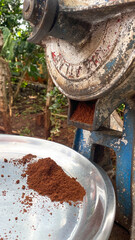 Wall Mural - Ground Roasted Coffee Beans from Manual Grinder