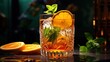 cocktail in a stylish glass, decorated with slices of orange and peppermint branches