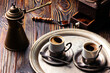 still life with a middle eastern coffee set, on wooden table
