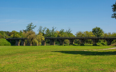 Wall Mural - The Drveni Most wooden bridge over the Korana River in Karlovac, central Croatia