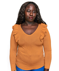 Poster - Young african woman wearing casual clothes skeptic and nervous, frowning upset because of problem. negative person.