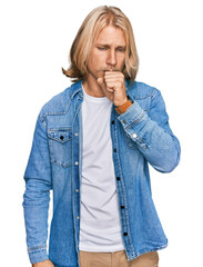 Canvas Print - Caucasian man with blond long hair wearing casual denim jacket feeling unwell and coughing as symptom for cold or bronchitis. health care concept.