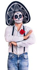 Poster - Man wearing day of the dead costume over background skeptic and nervous, disapproving expression on face with crossed arms. negative person.