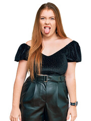 Poster - Young beautiful redhead woman wearing elegant clothes sticking tongue out happy with funny expression. emotion concept.