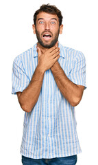 Poster - Handsome young man with beard wearing casual fresh shirt shouting and suffocate because painful strangle. health problem. asphyxiate and suicide concept.