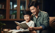 © pkproject - Father and son bonding together Father teaches child homework in living room, quality time at home