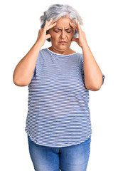 Sticker - Senior woman with gray hair wearing casual striped clothes with hand on head for pain in head because stress. suffering migraine.