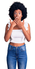 Poster - Young african american woman wearing casual clothes shocked covering mouth with hands for mistake. secret concept.