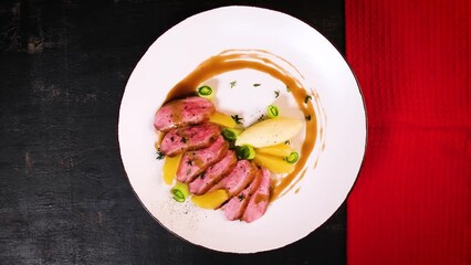 Wall Mural - Tasty duck breast with orange and mashed potatoes