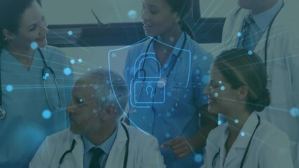 Poster - Animation of padlock icon over diverse doctors using tablet in hospital