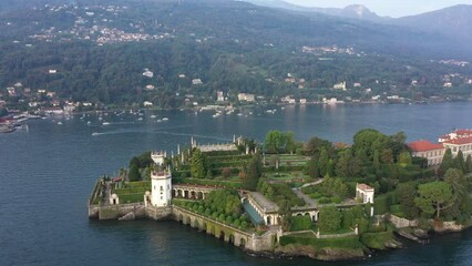 Wall Mural - Aerial view of the island, Isola Bella 4k. Drone video at sunrise on Lake Maggiore top view. Isola Bella is one of the Borromean Islands of Lake Maggiore in north Italy. 