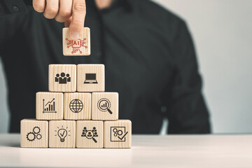 Assembled wooden cubes on the topic of the application of artificial intelligence in business