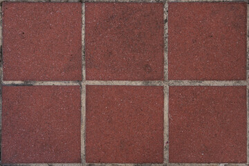 Wall Mural - Reddish stone tile on pavement outdoor