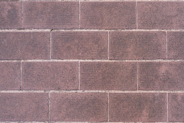 Wall Mural - Reddish stone tile on pavement outdoor