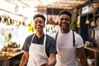 © Malynka - Coffee shop management: Two African hospitality entrepreneurs running a small business together, successful people standing at cafe