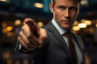 Male businessman points his finger at you, motivation concept