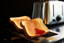 Breakfast Time. Bread Toast In The Toaster. Making Toast In The Toaster Oven For Breakfast With Your Morning Coffee. Crispy Bread Slices From Toaster. Preparing A Fried Loaf.