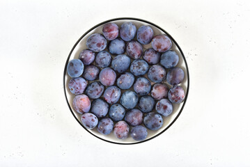 Wall Mural - Fresh plums on plate