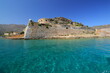 Spinalonga Island on a Beautiful sunny day showing the turqoius sea and blue sky. Crete, Greece, Europe.