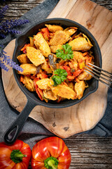 Wall Mural - Fried chicken with vegetables.