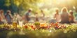 Picnic Food and People with Sun Flare Bokeh