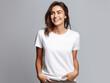 © Raanan - A young woman posing for a t-shirt mockup, wearing a blank , clean white shirt