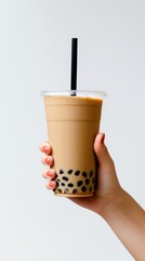 Canvas Print - A person holding a cup of bubble tea. Generative AI.