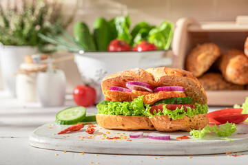 Wall Mural - Fresh and tasty sandwich with chicken, cucumber and tomato