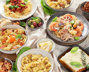 Wall Mural - Assortment of Italian pasta dishes on light bachground. Traditional food concept.